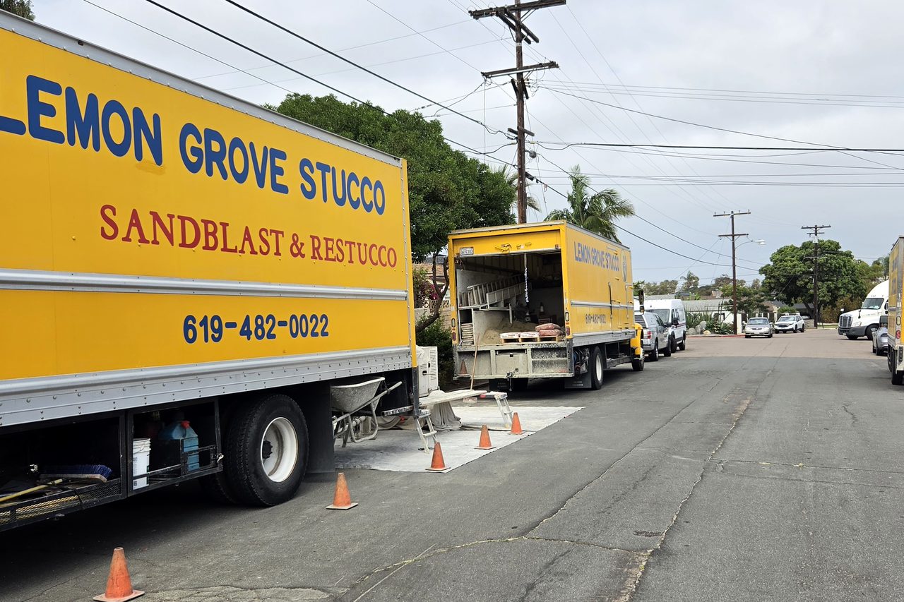 Lemon Grove Stucco box truck parked at a re-stucco job